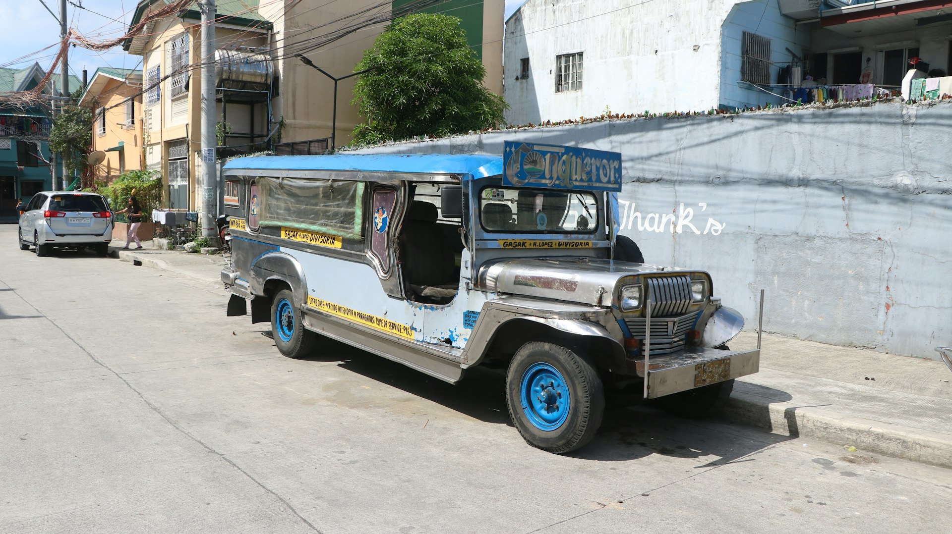 A jeep is parked on the side of the road